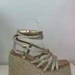SANDALIA ALTA TRENZADA DORADA
